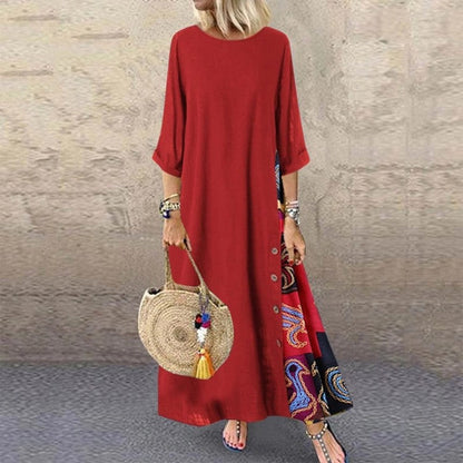 Colarinho redondo floral de outono com botões de bloqueio de cor e vestido de mangas patchwork. Solto e confortável, com cores de retalhos para um ar de elegância e generosidade. Disponível em 12 cores à escolha.