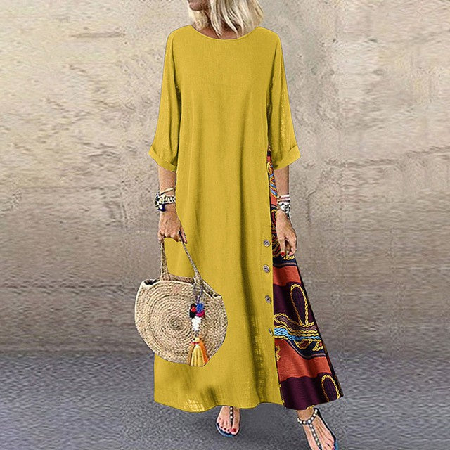 Colarinho redondo floral de outono com botões de bloqueio de cor e vestido de mangas patchwork. Solto e confortável, com cores de retalhos para um ar de elegância e generosidade. Disponível em 12 cores à escolha.